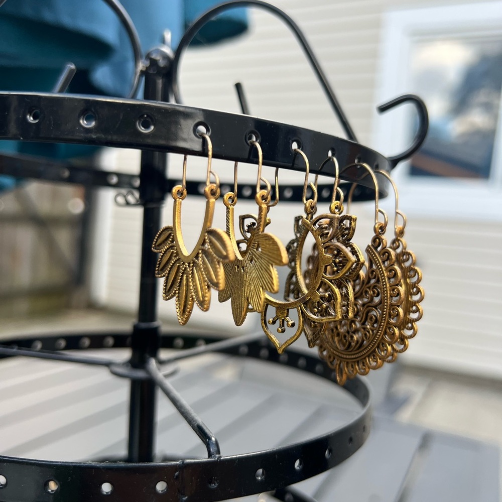 Three pairs of gold boho earrings